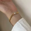 Guldarmband med 18K förgyllning med CZ – CEBGW002>Celine Estelle Best