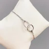 Silverarmband med ringar och CZ stenar- Reglerbart>Celine Estelle Best